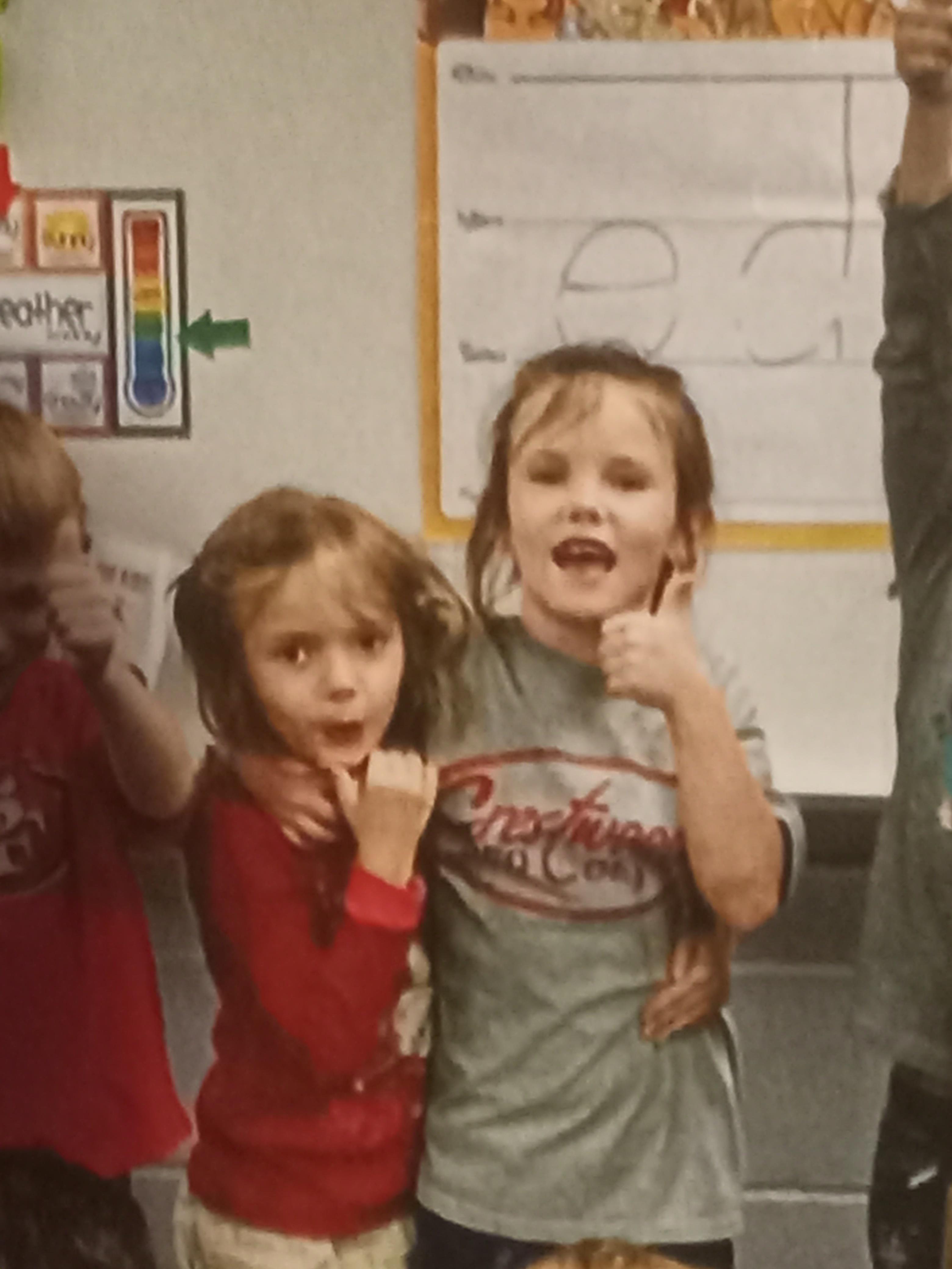 A group of children in a classroom