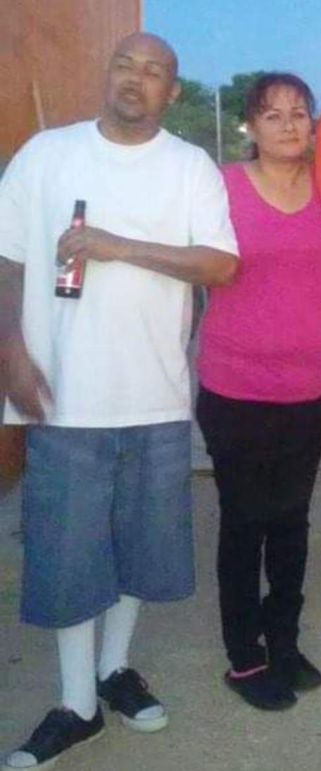 Friends gather in the evening, drinks in hand, enjoying each other's company.