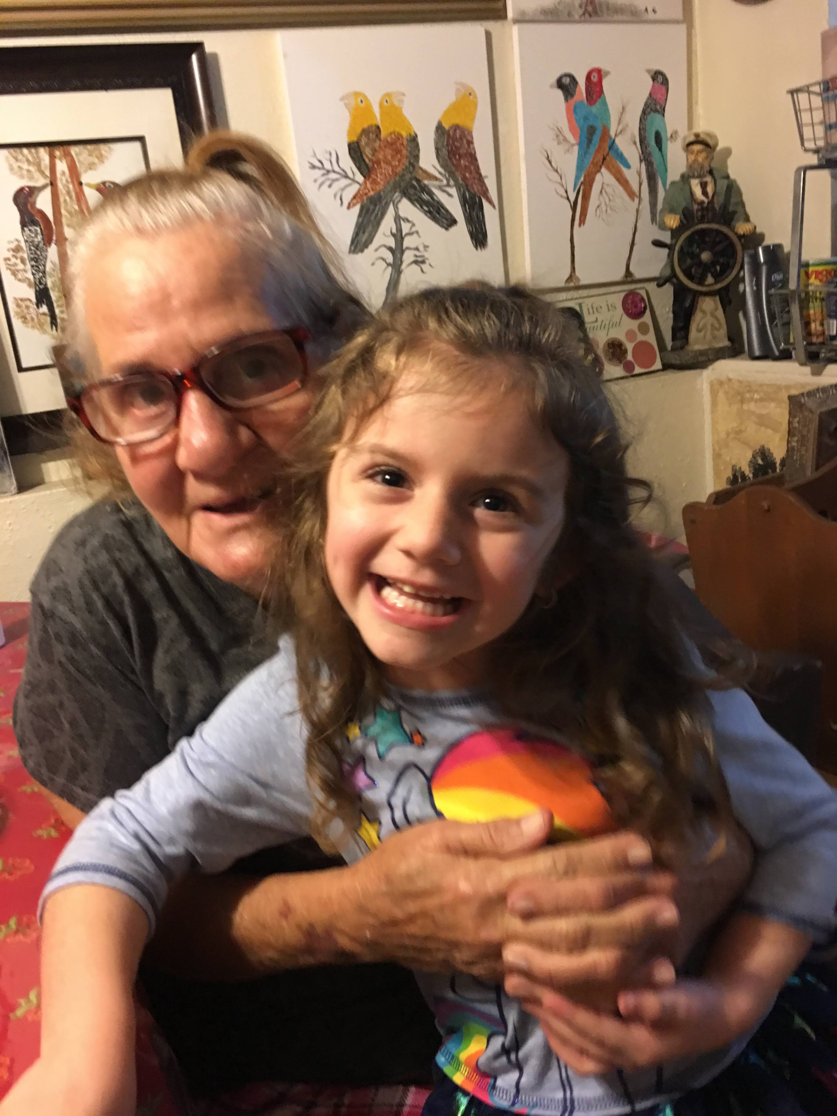 A woman and a child posing for a picture