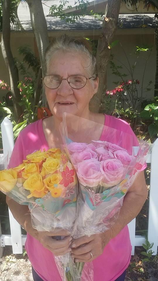 A woman holding flowers