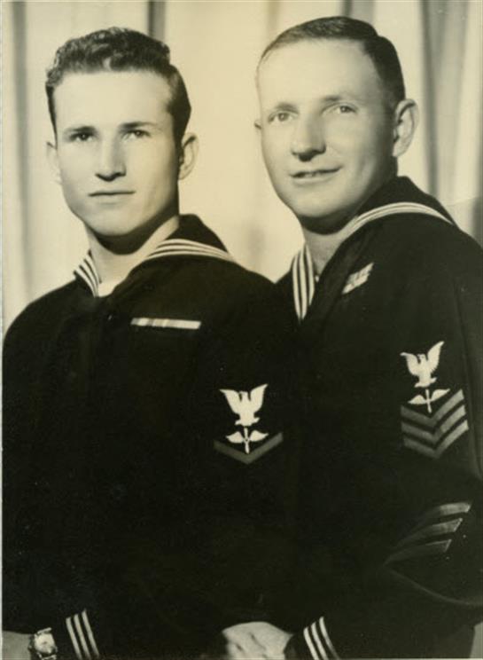 A couple of men in military uniforms