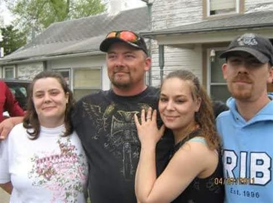 A group of people posing for a photo