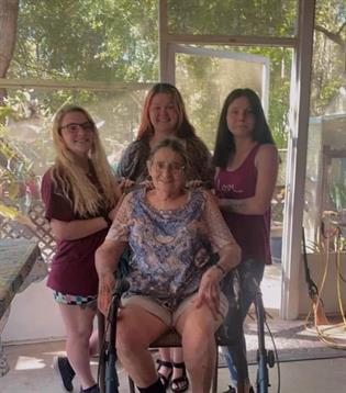 A group of women posing for a picture