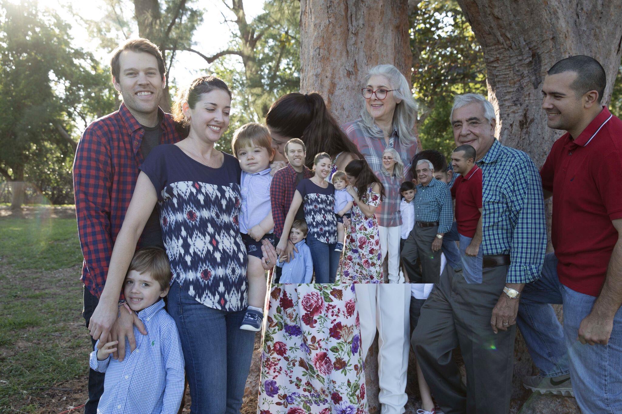 A group of people standing together under a tree