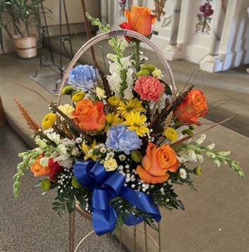 A bouquet of flowers in a basket