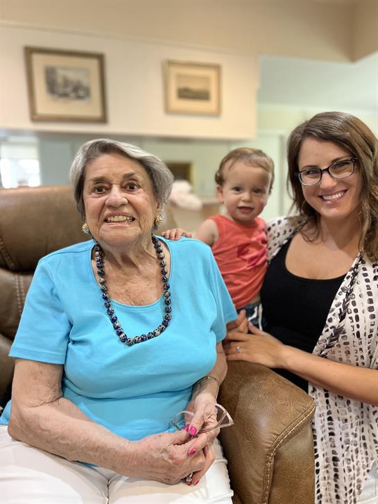 A group of women and a baby
