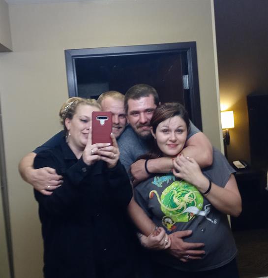 A group of people taking a selfie
