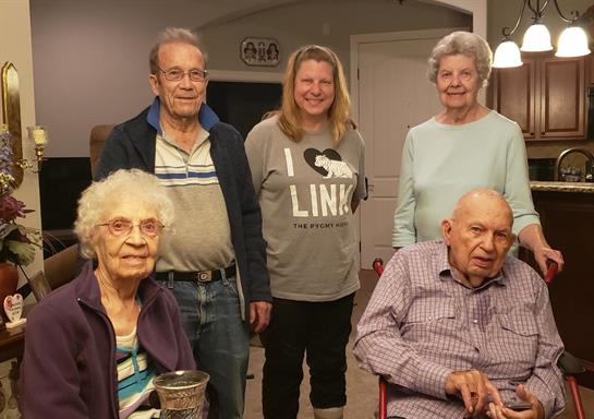 A group of people posing for a photo