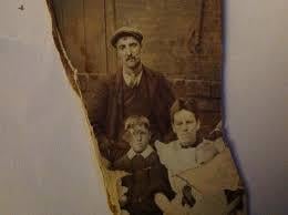 A man and two children