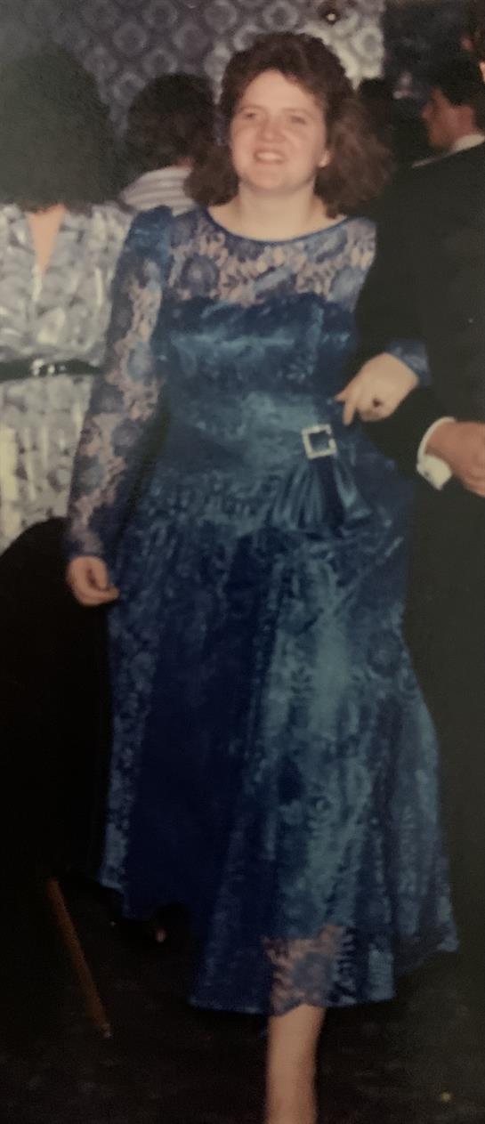 A woman in a blue dress