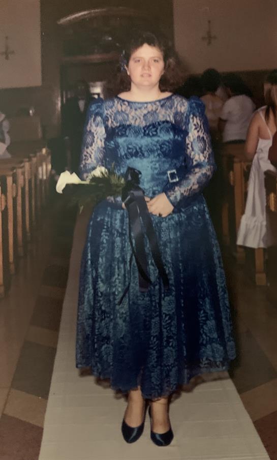 A woman in a blue dress