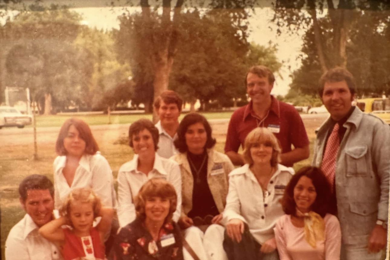 A group of people posing for a photo