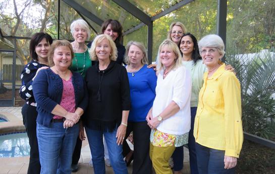 A group of women posing for a photo