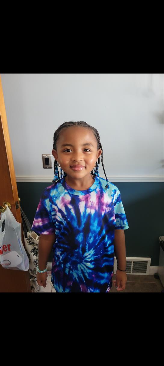 A girl smiling at the camera