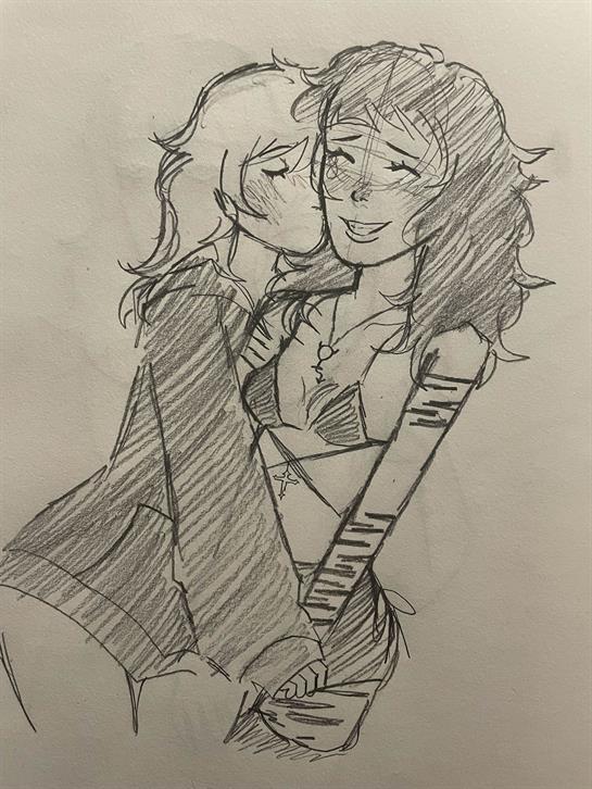 Two friends share a joyful and affectionate moment in a cozy setting while smiling and hugging.