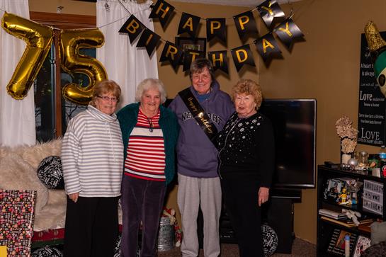 A group of people posing for a photo