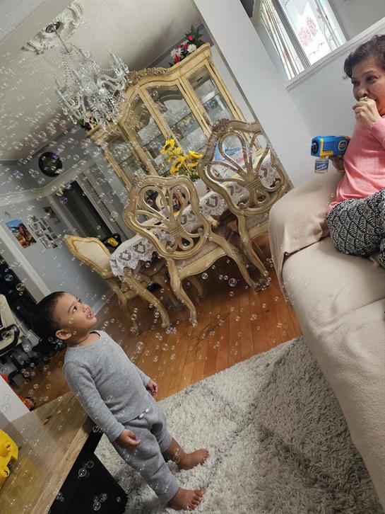 A child and woman in a room