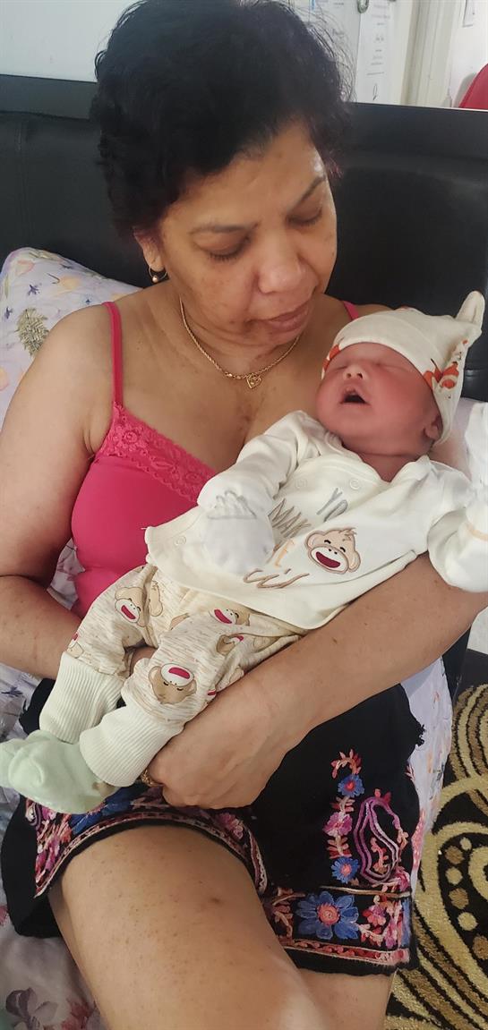 A woman holding a baby