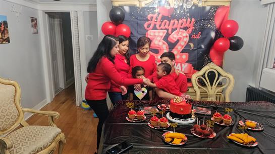 A group of people in red shirts