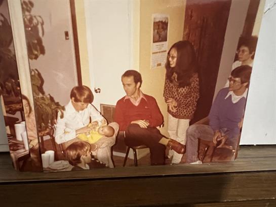 A group of people sitting in a room