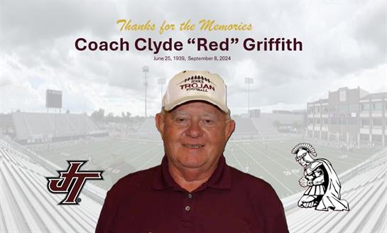 The community gathers to honor Coach Clyde Red Griffith for his contributions to athletics.