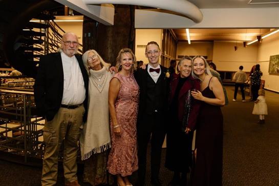 A group of people posing for a photo