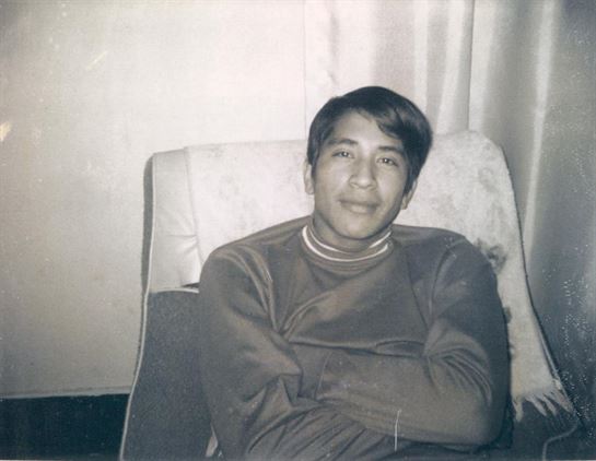 A man sitting in a chair