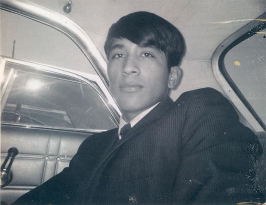 A man sitting in a car