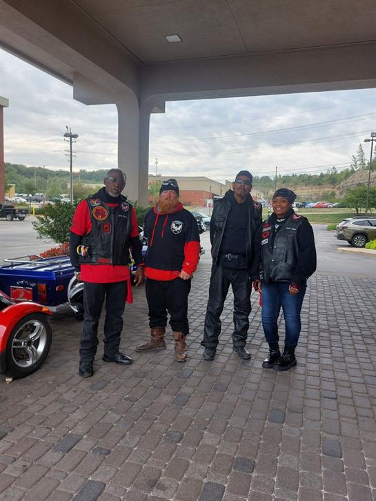 A group of people standing outside