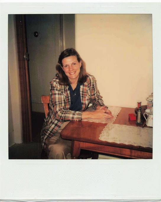 A woman sitting at a table