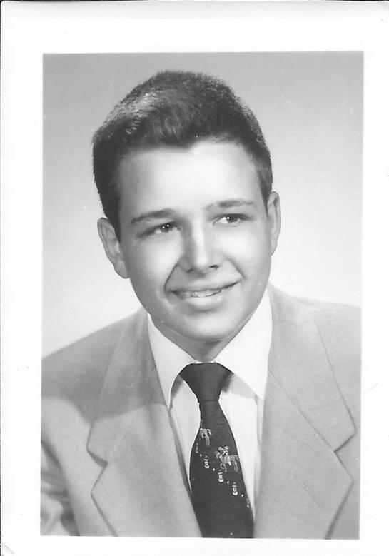 A young man in a suit and tie