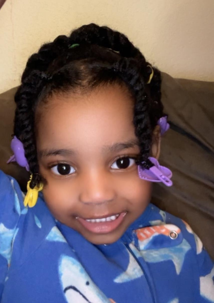 A girl with purple hair clips