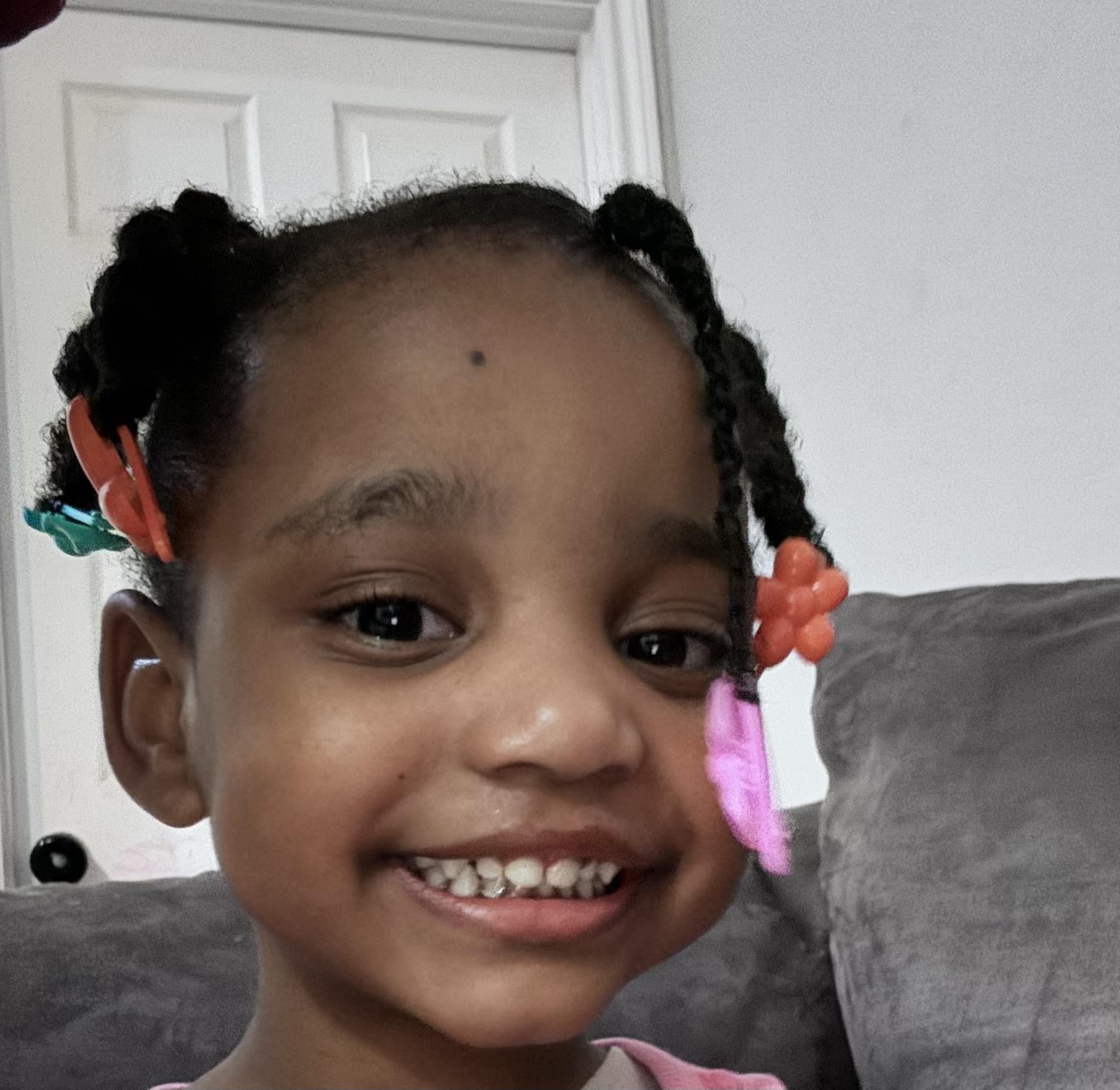 A girl smiling at the camera