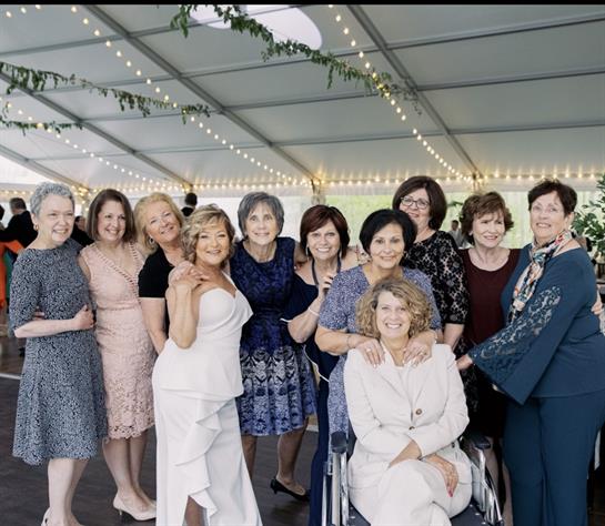 A group of women posing for a photo
