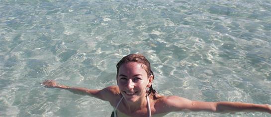 A woman in a swimsuit in the water