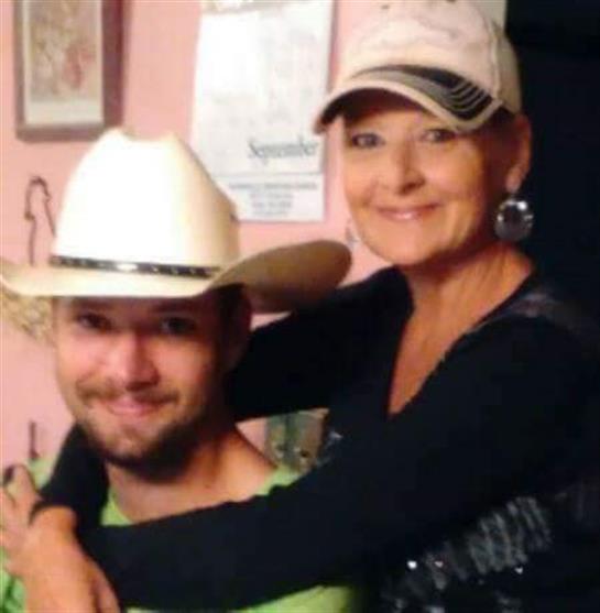 A man and woman wearing hats