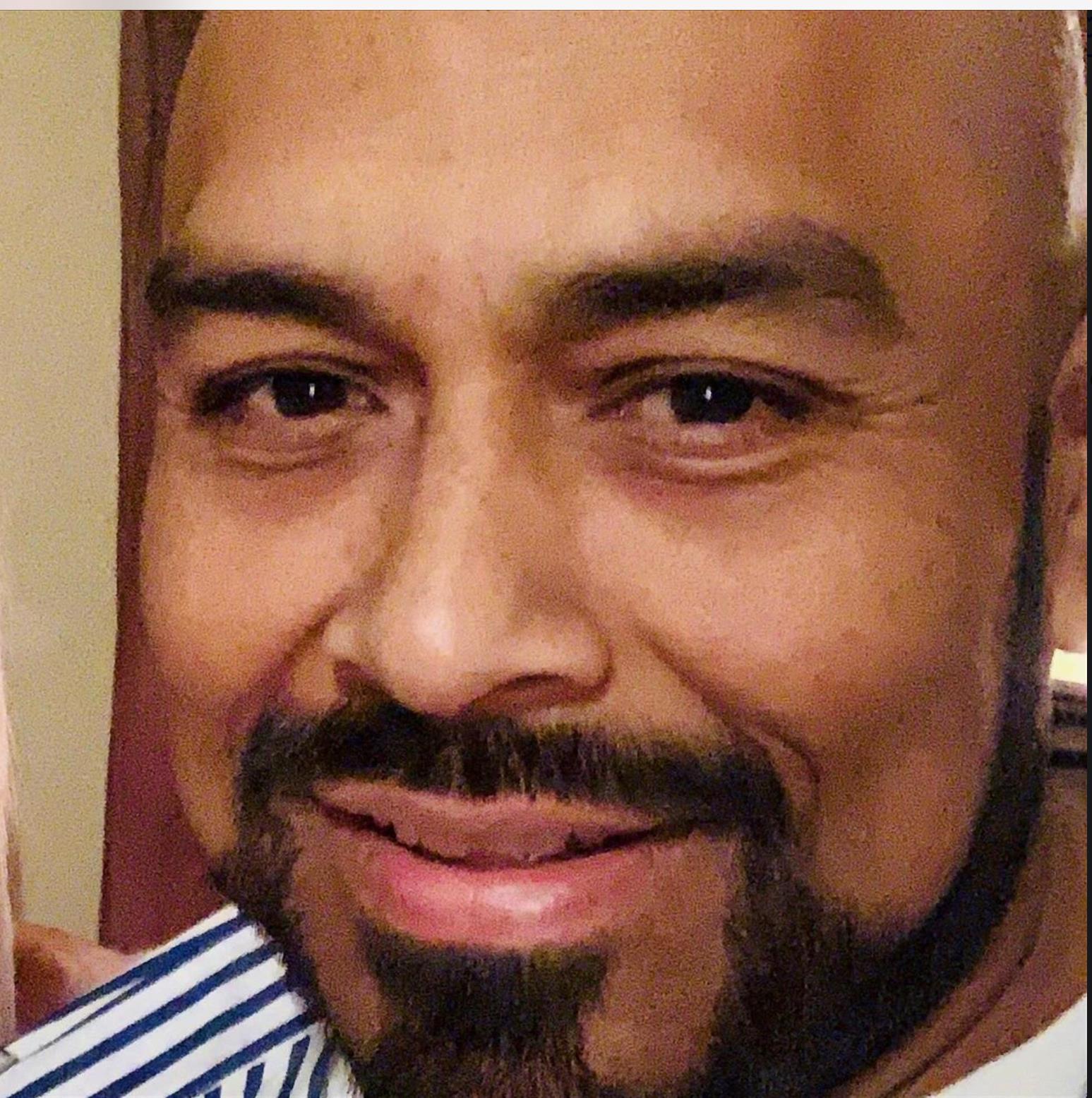 A man smiling for the camera