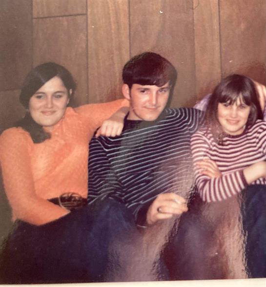 A group of people sitting on a couch