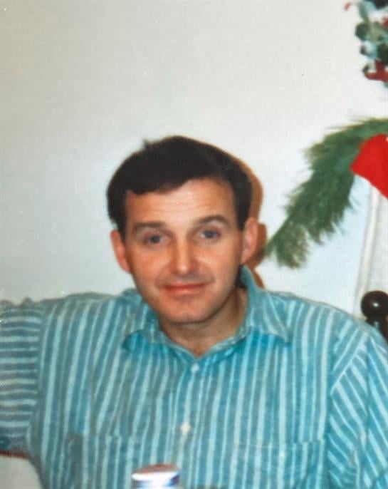 A man in a striped shirt