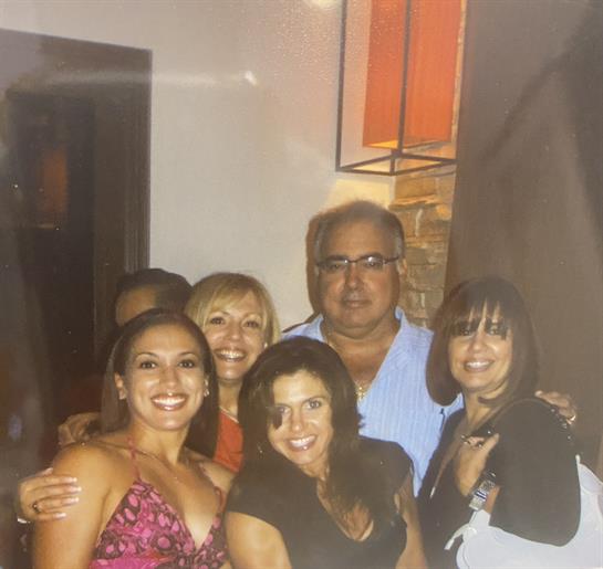 Friends enjoy each other's company during a joyful celebration in a cozy atmosphere.