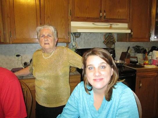A woman and a woman in a kitchen