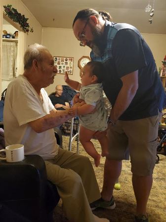 A man holding a baby