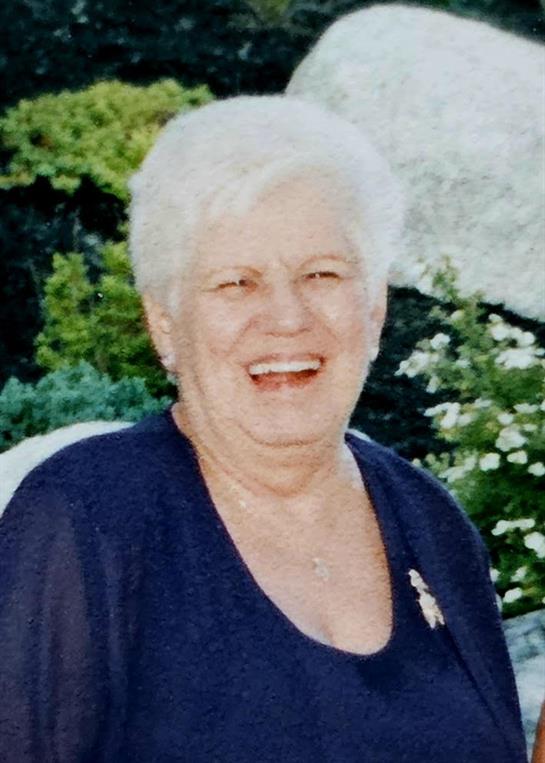 A woman smiling at the camera