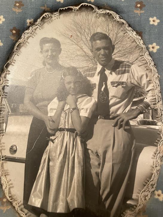 A man and woman posing for a picture