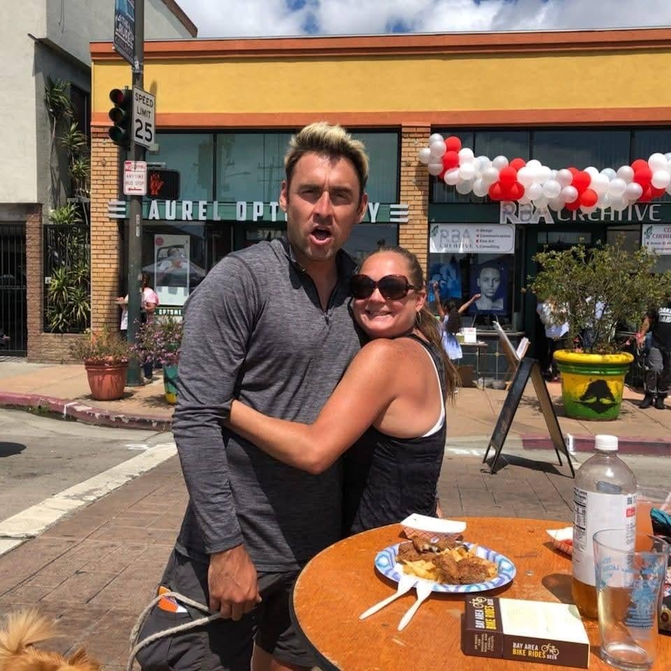 A man and woman posing for a picture