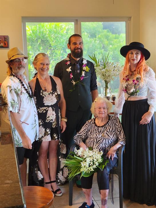 A group of family members gathered together joyfully, showcasing love and connection.