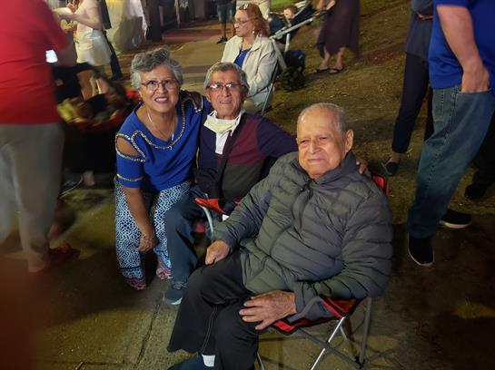 A group of people sitting in chairs