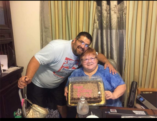 A man and woman posing for a picture