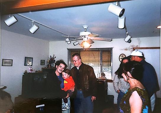 A group of people standing in a room