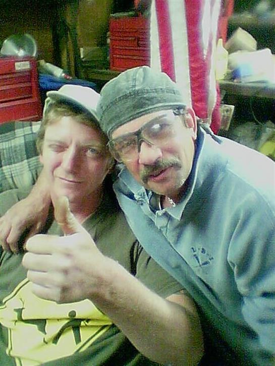 Two men sitting on a couch